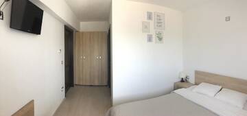 Фото номера Двухместный номер с 1 кроватью Гостевой дом Casa Elysium г. Вэлени-де-Мунте 3